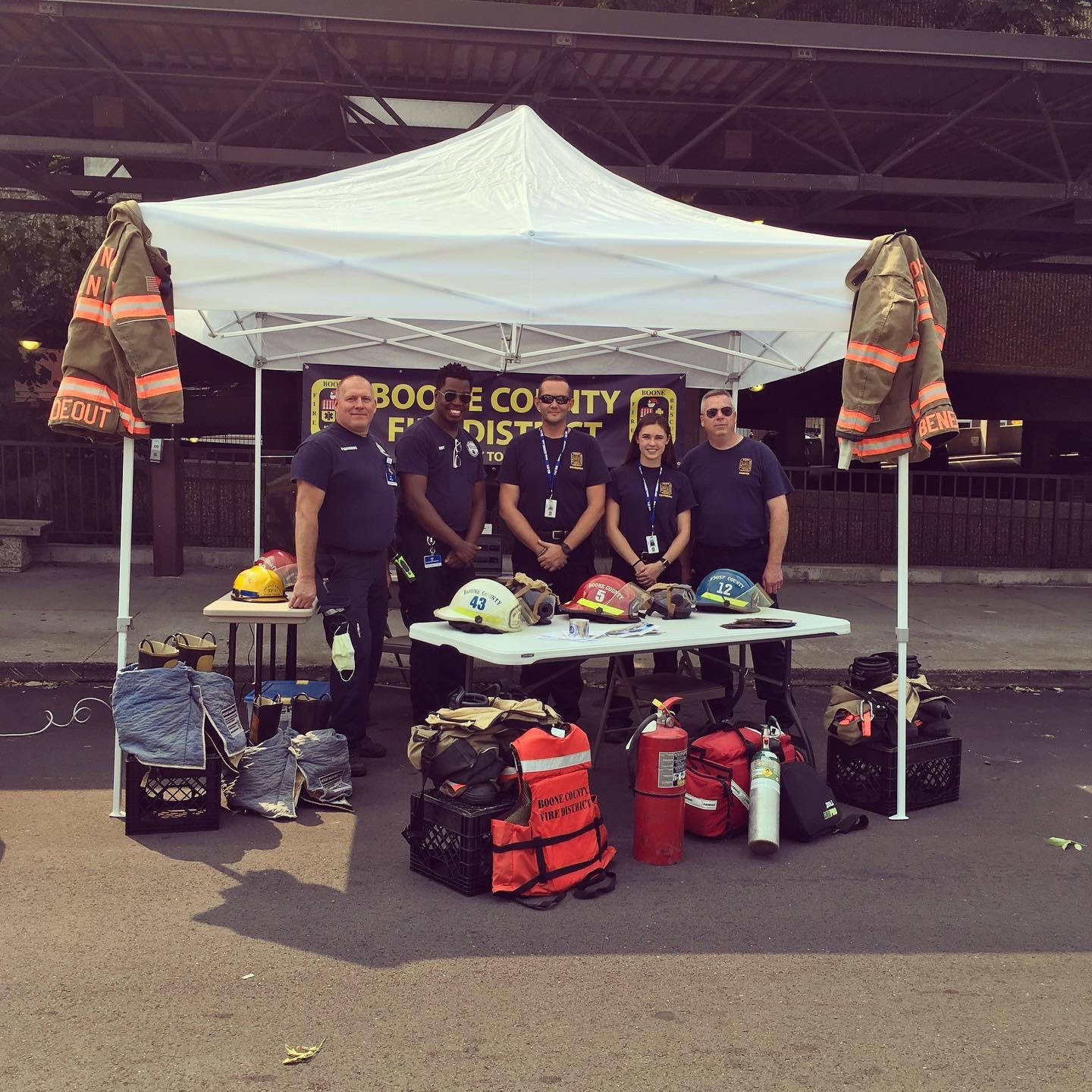 Members of the Boone County Fire Protection District take a break from talking about fire prevention while participating at the 1st annual Preparedness Fair.
